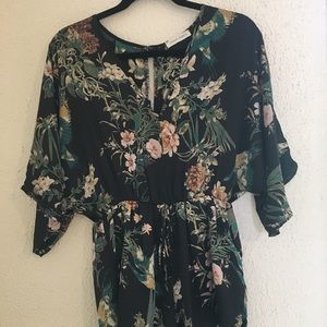 Silk romper with exotic pattern